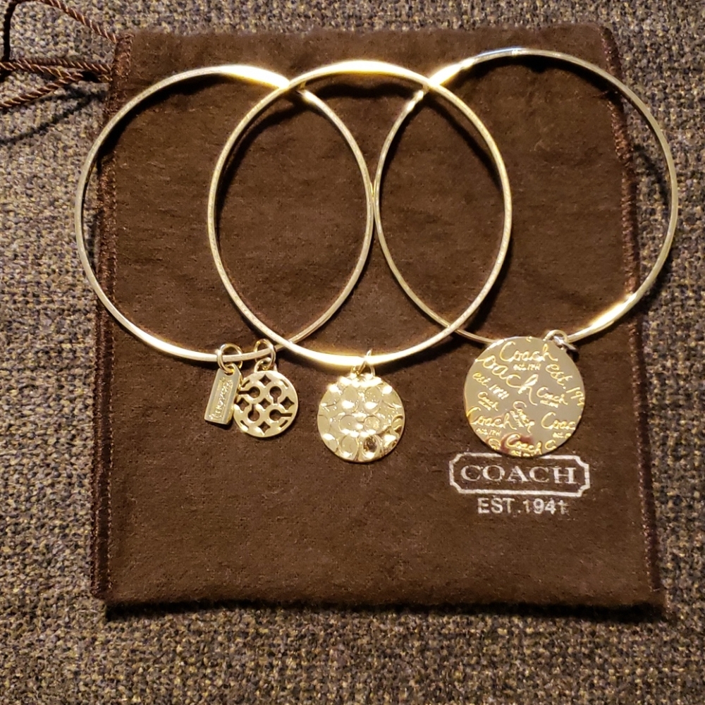 Coach stacking bracelets goldtone